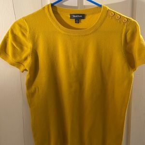 Mustard yellow, short sleeve sweater.